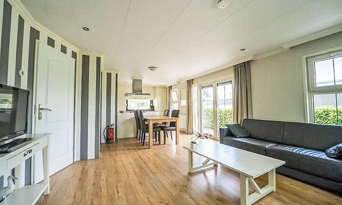 Dordtse Biesbosch House | Stunning private villa for 4 people with pool, WIFI, TV, terrace and parking