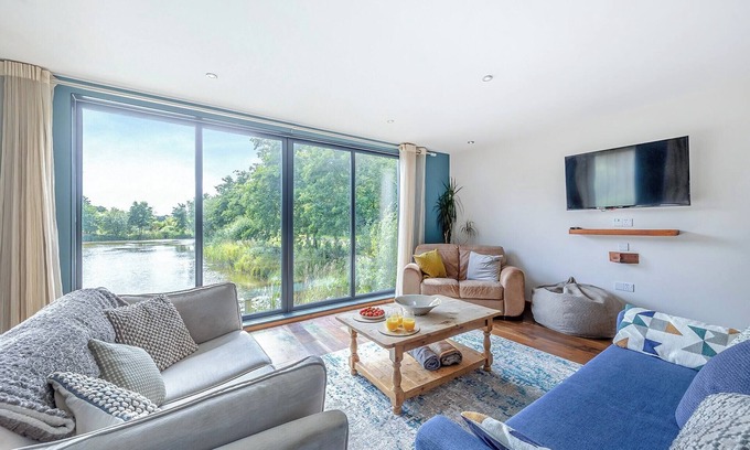 Menai Bridge Ski Chalet | Stunning two storey contemporary lodge on the edge of the lake.