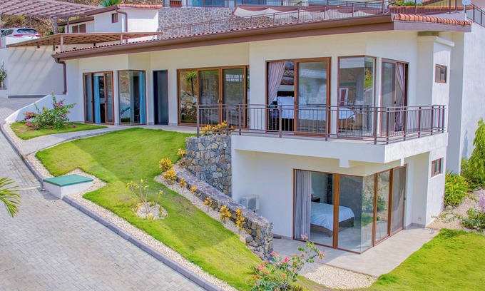 Coco House | Stylish 2-Level Villa | Ocean Views + Club Access