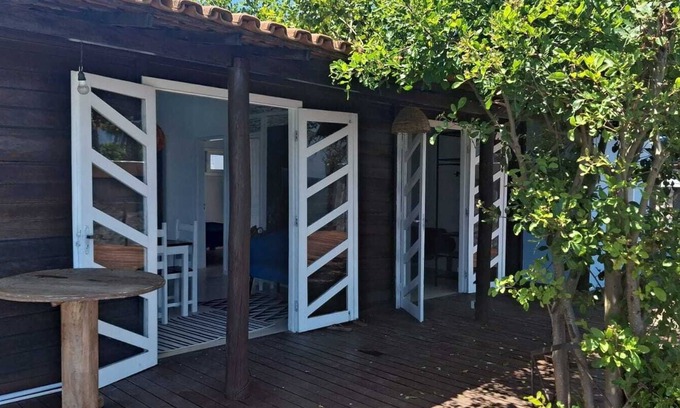 Itacare Ski Chalet | Stylish cabin with large deck overlooking Costa and Tiririca beaches.