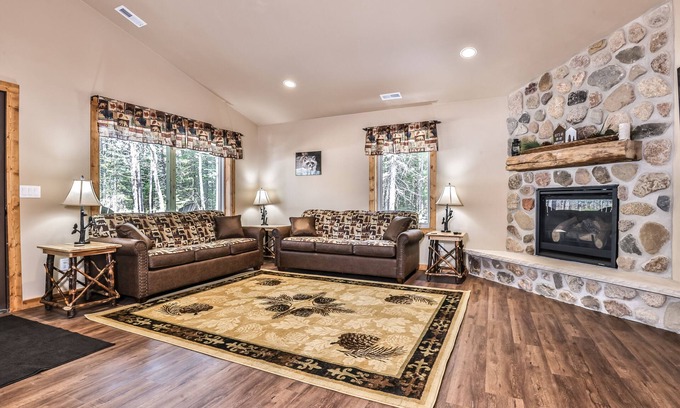 Conover House | Stylish dog-friendly cabin with hot tub, fireplace, patio, grill, central AC, & W/D