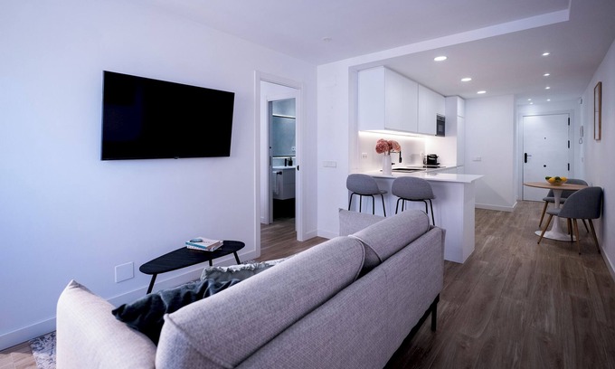 Castillejos Apartment | Stylish High-Floor Retreat with Sunny Terrace