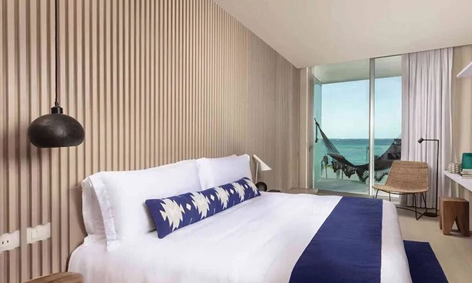 Downtown Cancun Hotel | Stylish Ocean Front Suite w/Balcony | 2 Family Ready Rooms | Outdoor Pool