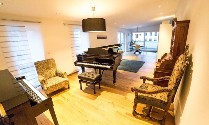 Trier Apartment | Stylish penthouse apartment with terrace in best location with grand piano