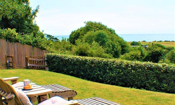 Hythe House | Stylish Seaview House with Hot Tub