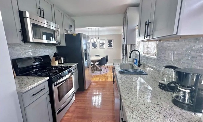 Clinton Township House | Stylish, Spacious, 4 TV's, Game Room w/Bar and Lounge Area