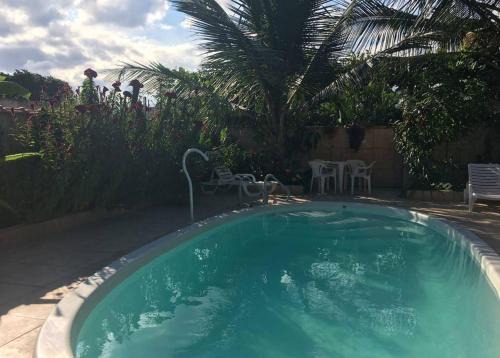 Bairro da Enseada House | Suíte 1 com piscina e wi-fi em Caraguatatuba