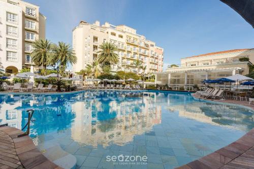 Jurere Resort | Suíte com vista para praia dentro de hotel - Seazone ILCTOP
