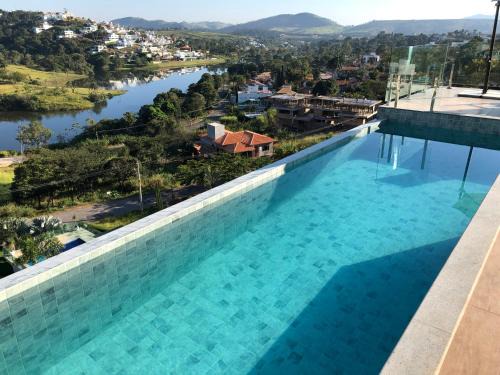 Capitolio House | Suítes de Luxo Paraíso de Minas Escarpas
