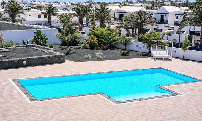 Costa Teguise Ski Chalet | SugarSand Senator in a complex with pool