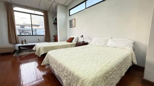Cooperativa Empleados Consejo Provincial House | SUITE 2 CAMAS, TV, WIFFI, PARKING, a 3 MINUTOS DEL AEROPUERTO DE GUAYAQUIL, LAS GARZAS SAN MARINO SHOPPING