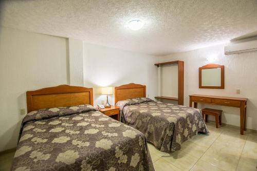 Leon Hotel | Suites Poliforum Inn