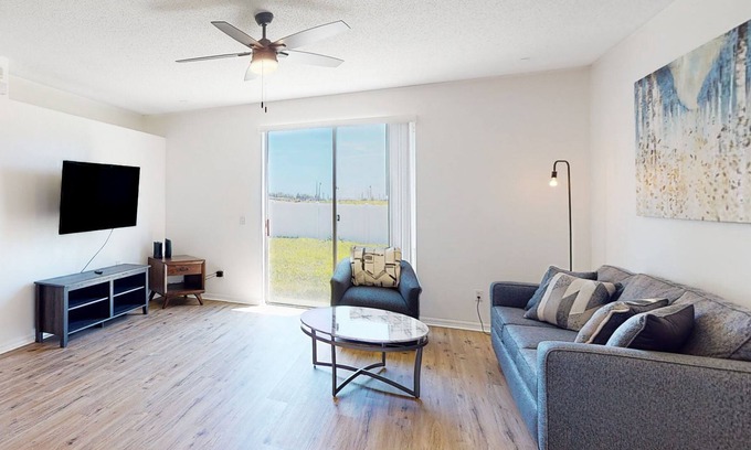 Sunset Ridge House | Sunny home near Disney with enclosed backyard, fast WiFi, W/D, patio, central AC