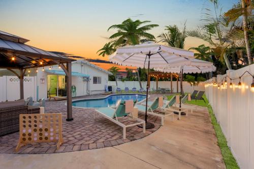 Garden Isles House | Sunset Oasis with Movie Theatre, Heated Pool & Game Room
