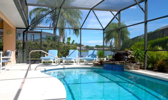 Sunset Lakes Villa | Sunset Retreat Villa-Disney/Princess Rooms -Private Pool Area/Tropical Waterfall