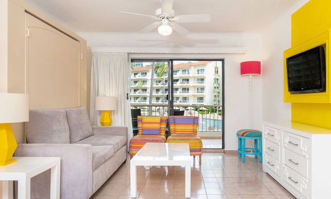 Fluvial Vallarta Condo | Sunset Views & Resort Perks! 2BR Oceanfront Suite in PV’s Heart