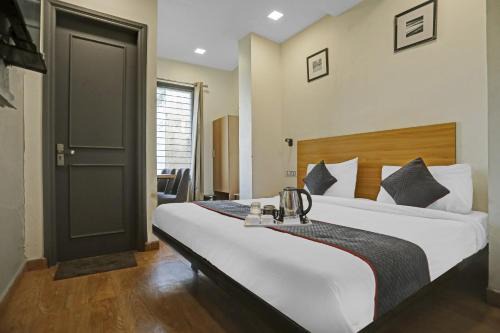 Rohini Hotel | Super Townhouse Mannat Rohini 16
