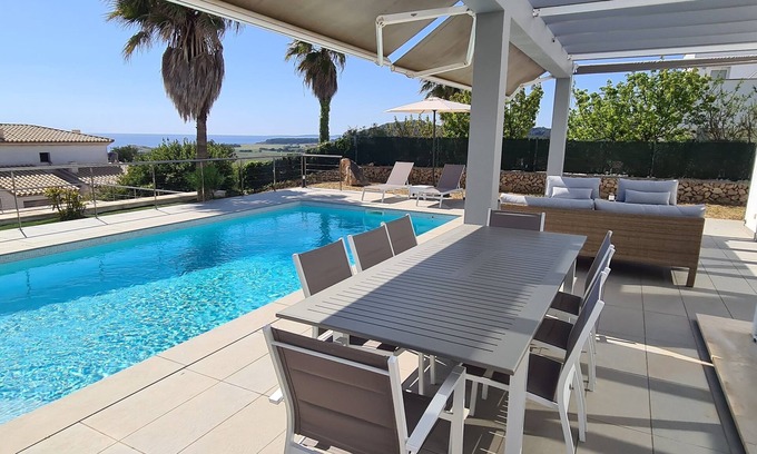 Sant Jaume Mediterrani House | Superb modern villa with swimming pool. Magnificent views of Son Bou beach. Beaches on foot