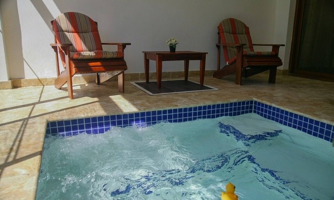 Guayacanes Condo | Terrace, golf course views, jacuzzi, gated community