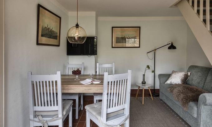 Manhagen Apartment | Thatched roof house with proximity to the Baltic Sea, outdoor sauna, playground & large garden