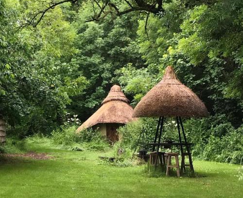 Ash Other | Thatched Roundhouse in Somerset Woodland