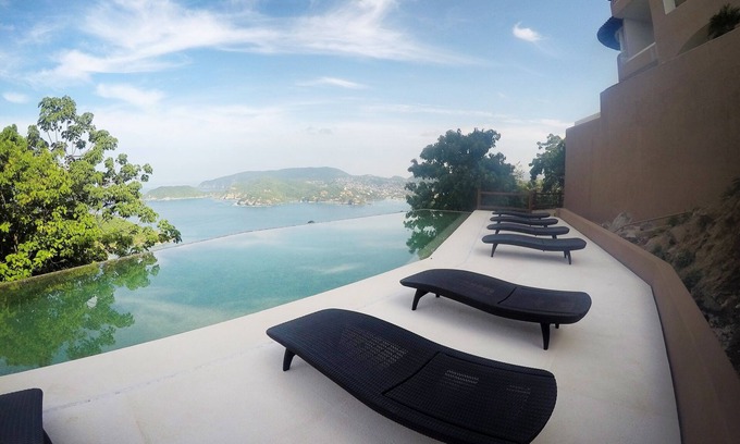 Cerro del Vigia Condo | The area’s highest point with unobstructed views of Playa Blanca & the Zihua Bay