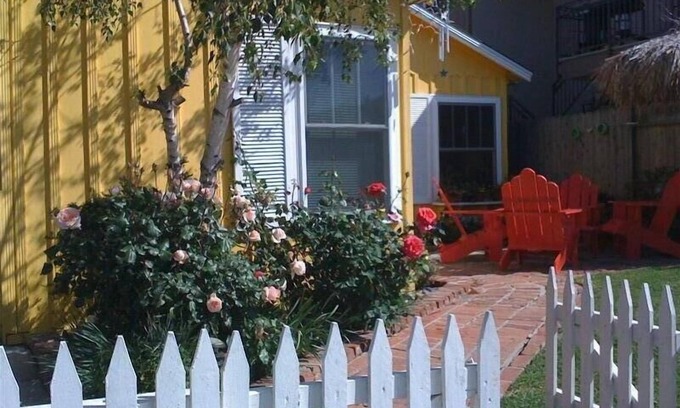 Corona del Mar House | The Artists' Yellow Beach Cottage