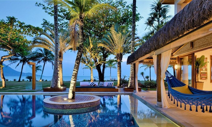 Guaeca House | The best home with the best view of Guaecá - 6 suites, home Standing in the sand.