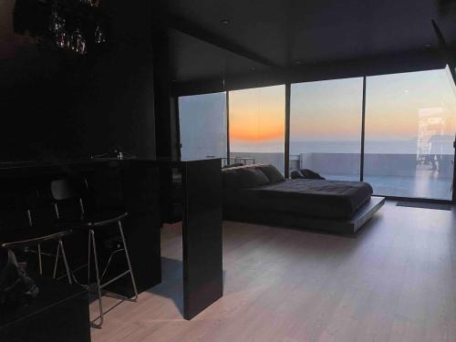 Playas De Tijuana Apartment | The Black Room