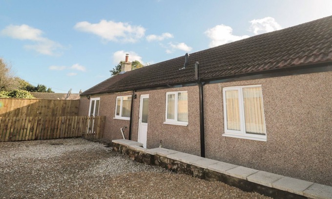 Longframlington Cottage | THE BUNGALOW, pet friendly, with a garden in Longframlington