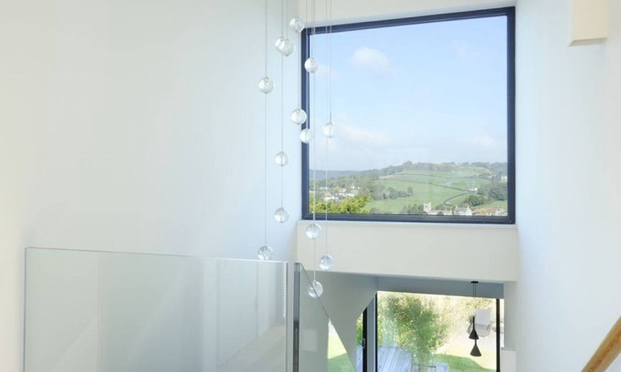 Lyme Regis House | The Cedar House in Lyme Regis. Luxurious contemporary home, with a beach hut.