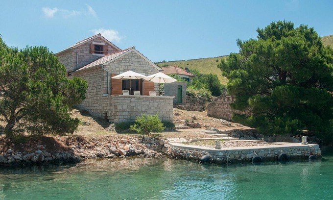 Kornati House | The extremely beautiful stone villa Kornati is located in central Dalmatia, south of Zadar and west
