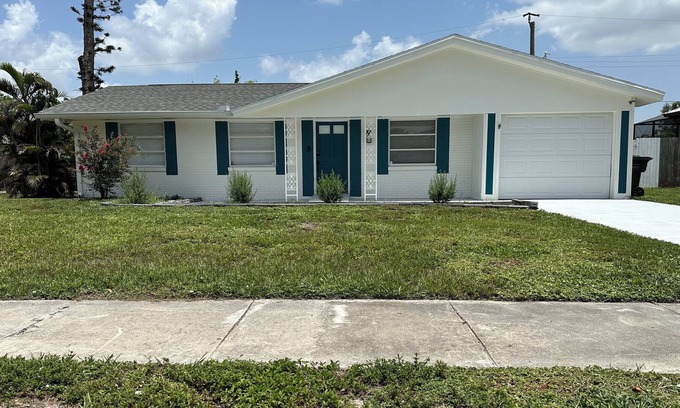 Cypress Lake House | The Getaway House! 10-15 Minutes away from the beach and downtown Fort Myers.