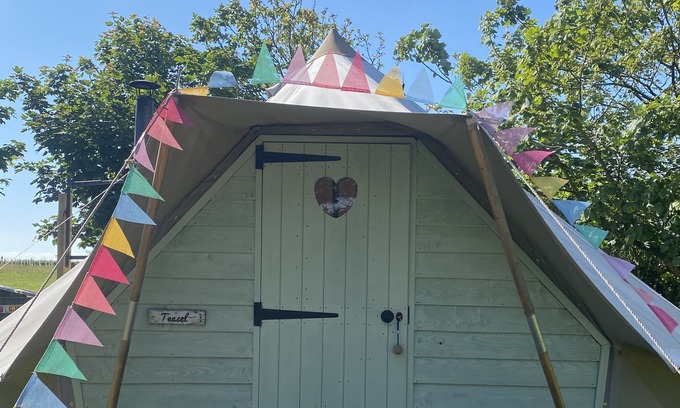 Camborne Cabin | The Glade. Luxury Bell Tent with partial sea and countryside views. Dog friendly