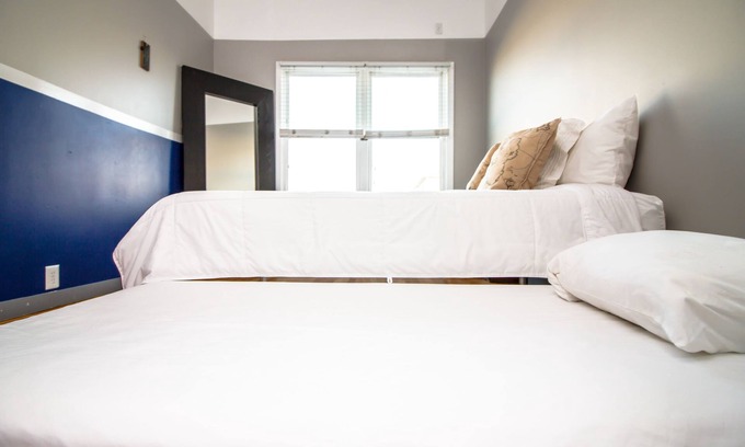 Queens Condo | The High Tide Two Bedroom Suite #8 Hotel Room by RedAwning