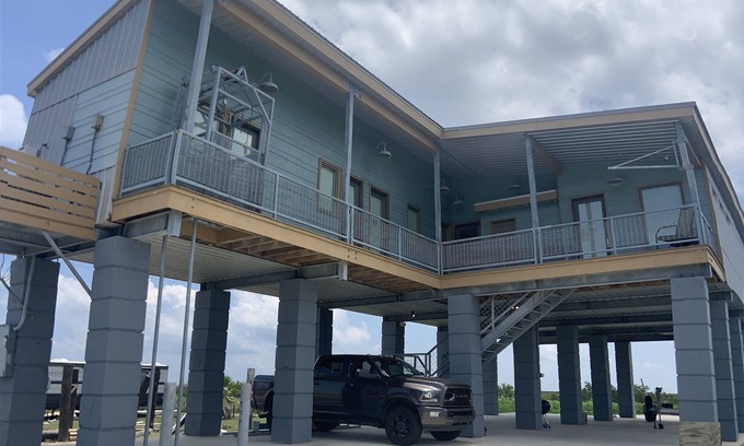 Golden Meadow House | “The Office” of Grand Isle, a modern camp with gorgeous views!