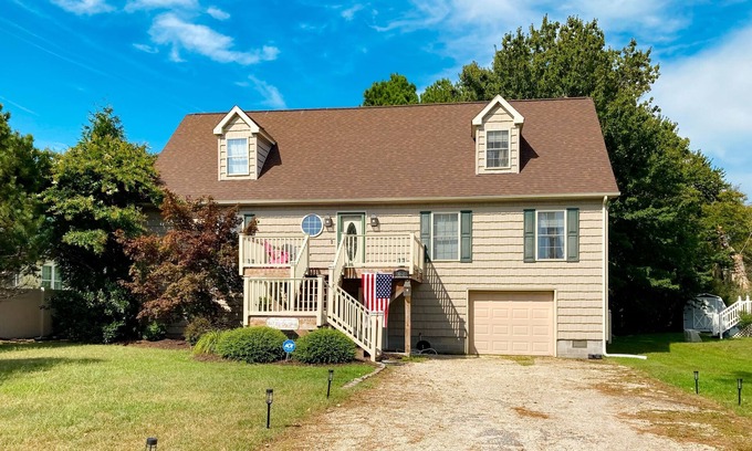 Cedar Neck House | The Reservation - dog-friendly home with fenced yard, deck, grill, & beach gear