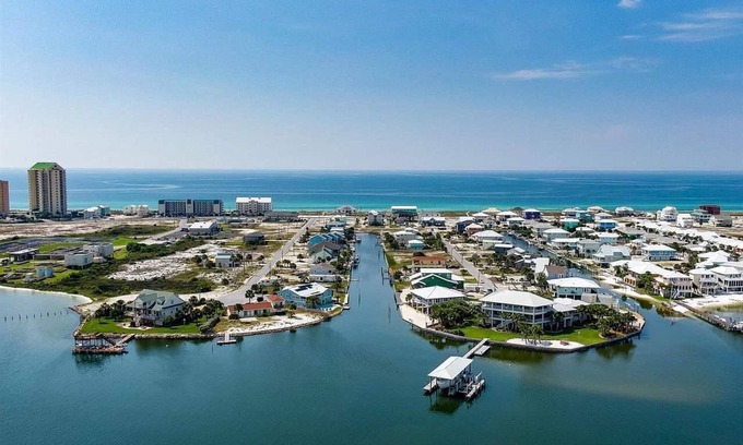 Navarre Beach House | The Sea Turtle House-Sound View Canal-Dock-Private Heated Pool-Elevator 3BR 3BTH