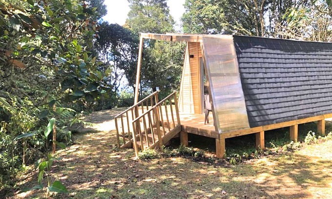 Guarne Cabin | The Shire Glamping - nestled among lush trees, tranquil atmosphere