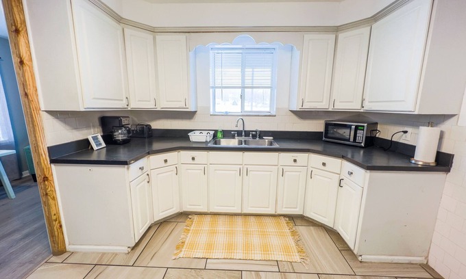 Niagara Falls Apartment | The Stone Castle - With Private Yard & Parking, Near Falls & Casino by Niagara Hospitality