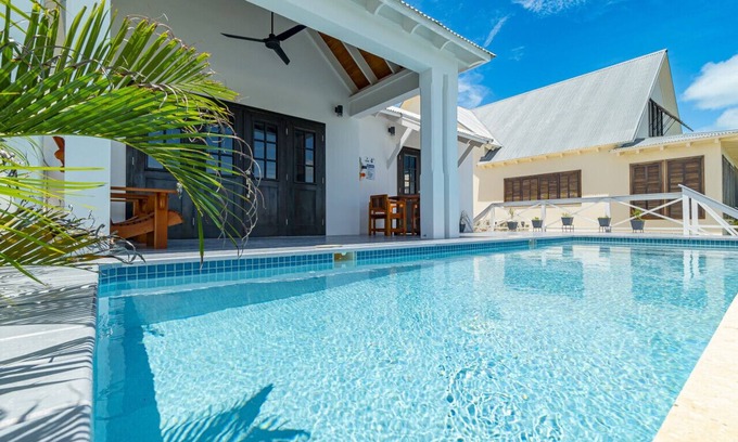 San Pedro Villa | The Toucan's Nest & Pool Club at Mahogany Bay