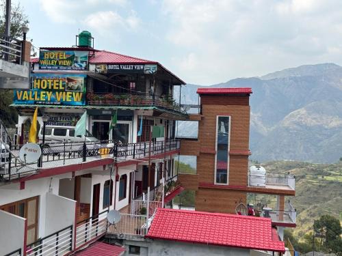 Mussoorie Hotel | The Valley View -"in the lap of valley"- Mountain view ! Personal Balcony ! Open Terrace ! Rooftop Cafe ! Large Parking ! free WiFi