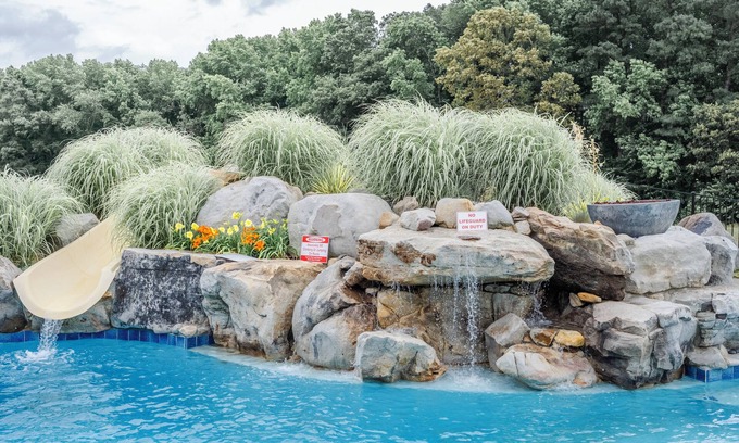 Denton House | The Wilder Way with a beautiful pool, hot tub, and a pickleball court!