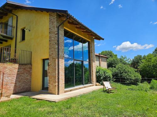 Capriglio House | The Window on the Forest