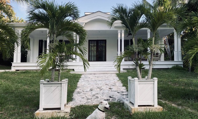 Dunmore Town Cottage | Theatrical retreat set just above Harbour Island's Pink Sand Beach, bold design meets island calm