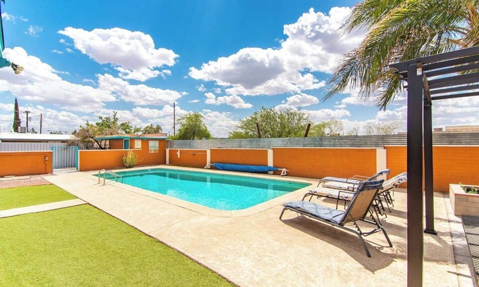 The Garden District House | This centrally located 1 bedroom features a full size pool and electric vehicle charging on site.