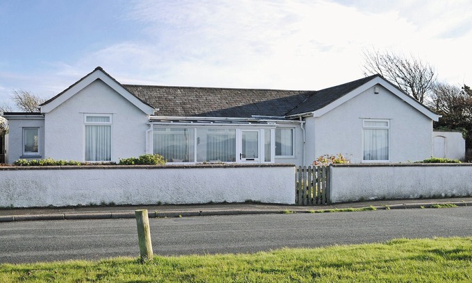Wigton Cottage | This charming cottage is situated just 50 yards away from the beach, and enjoys beautiful views.