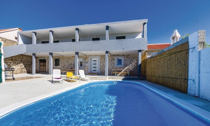 Velim House | This tastefully furnished vacation home with pool is located in Nadin, which belongs to the municipa