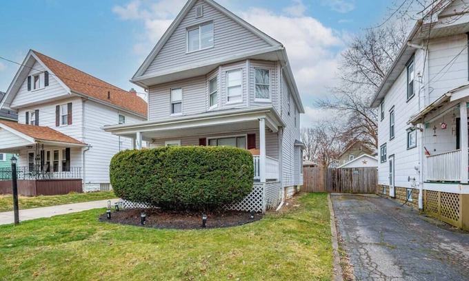 Akron House | This vintage home in Akron provides easy access to nearby cities & attractions.