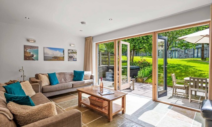 Talland House | This wonderfully light open-design, pet friendly house overlooks the charming natural pool and is cl